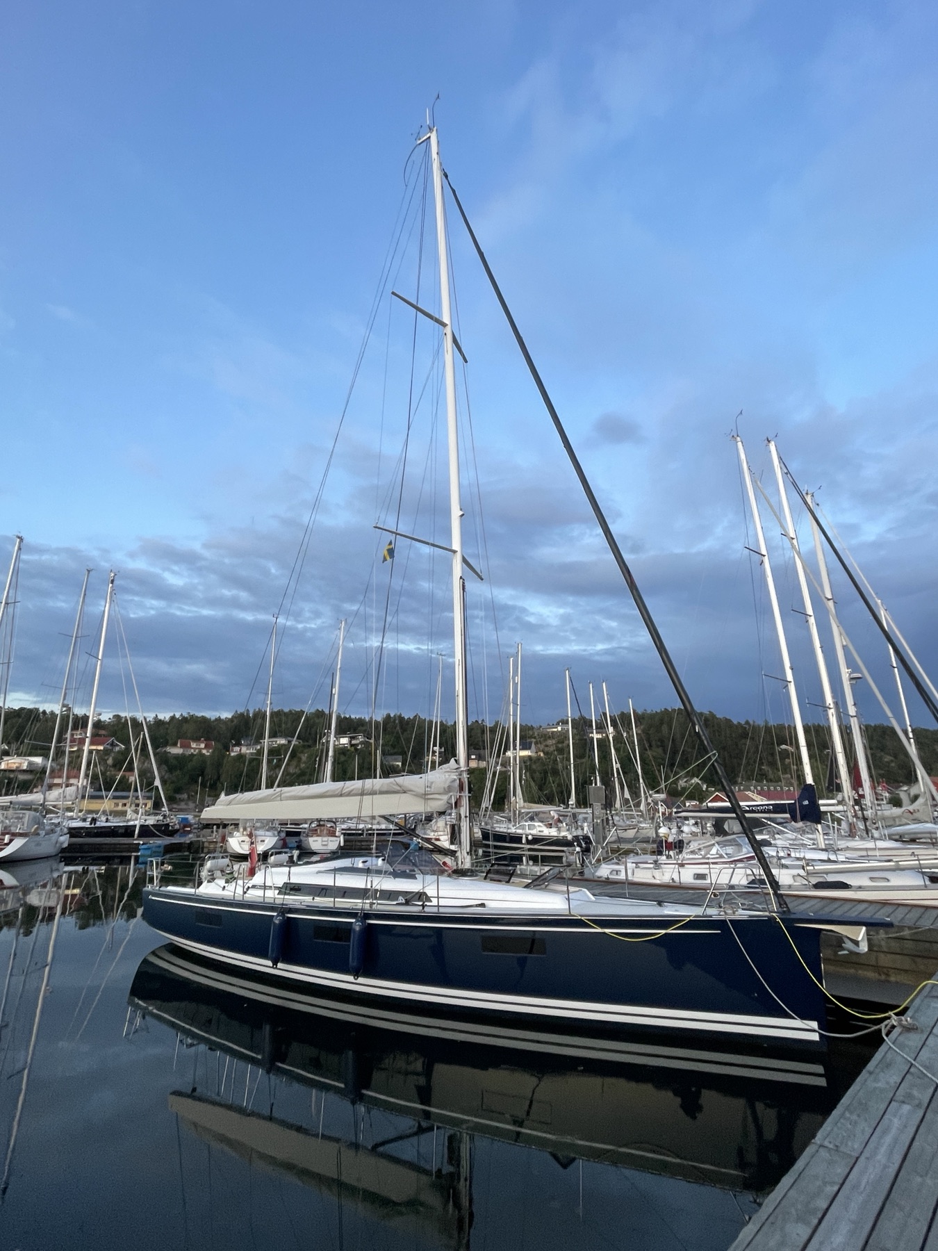 New-build blue Arcona 435 moored in Henån before departure