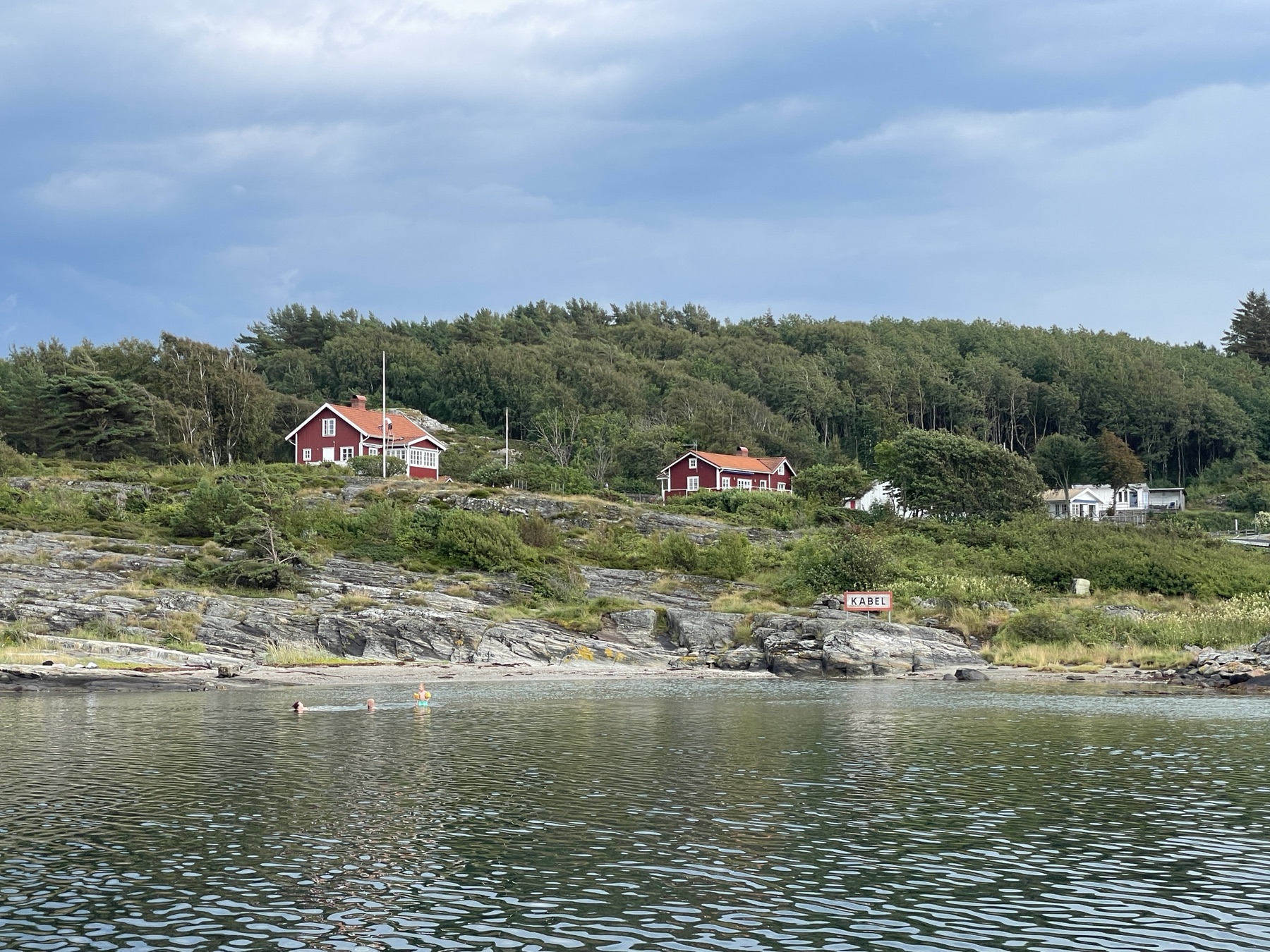 Red timber houses on the rocky Swedish west coast