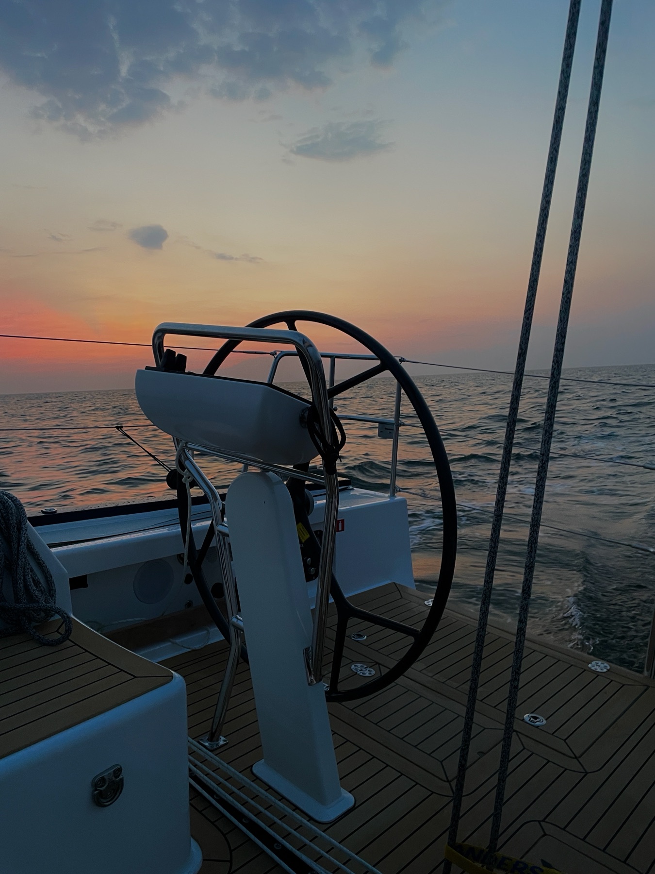 Sunset behind the helm during the overnight passage to the Hamble